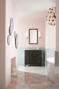 In this tender pink and stately gray bathroom, elegance goes modern for a look that’s demure, yet decidedly spirited.