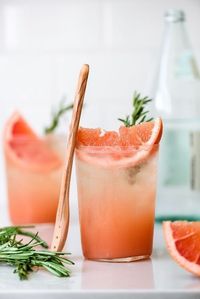 Tart and fizzy honey rosemary grapefruit sodas combine a sweet and herbaceous rosemary simple syrup with fresh grapefruit juice and pure honey for a flavorful, naturally-sweetened homemade soda you’ll want to sip on all Summer long.