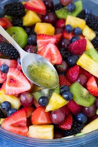 This Fruit Salad with honey lime dressing is sweet and full of fresh flavor. This easy fruit salad recipe is a favorite summer side dish! It's easy to customize with other fruits that are in season.