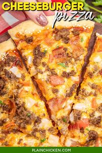 Cheeseburger Pizza Recipe - two favorites in one! Crispy pizza crust topped with juicy ground beef, crispy bacon, melted cheese, tangy ketchup-mustard sauce, onions, tomatoes, and sesame seeds. It's like biting into a cheeseburger with every slice! Perfect for family dinners or game night.