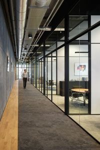 At the 5th floor of the new skyscraper ‘De Rotterdam’, Fokkema & Partners designed a new office for an international trade company. The interior celebrates the scale and character of the building, but above all it identifies with the characteristics of the company, where ‘bold’ and ‘corporate’ meet.