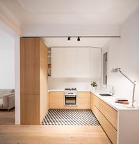 EO Arquitectura eschews tiles for timber in Barcelona apartment renovation