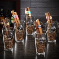 Cigars are smoked to commemorate major milestones. Asking someone to join your wedding party is one of those milestones. These cigar groomsmen gifts have a black cigar cutter that will work great on any cigar and a custom pint glass that can be filled with whatever beer goes great with the cigars your groomsmen will be enjoying. Each pint glass is engraved individually for each groomsman so theyll each receive a unique gift they will love. Cigars are not included, so tossing in one or two is a great way to kick off a pre-wedding celebration. Additional cigar groomsmen gifts can be added so no one is left out. Every pint glass measures 6 x 3.5 and can hold up to 16 ounces. Cigar groomsmen gifts are a fun way to honor your wedding party Also works for your best man, father-of-the-bride, or a