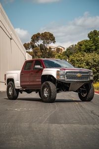 Check out this rad Chevy Silverado build in progress! So far this truck is fitted with our front long travel race kit, custom front bumper & valance,our plate rear bumper, FIberwerx bedsides & fenders. Wheels are KMC Mesa Beadlocks wrapped in a 37" Nitto Ridge Grappler. This truck will be coming back to Dirt King for a round 2 on the rear end and go to our ultra 4-link kit