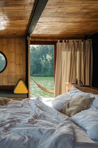 My Favorite Airbnb in Thailand: A Remote Eco-Villa Floating on a Lake in Kanchanaburi | Condé Nast Traveler