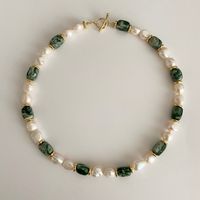 Product details: -The handmade necklace is designed with natural stone(Green Dot Jade) and baroque pearl. -450mm/17.7" in length.-Please note that no two stone or pearls are exactly the same; they range slightly in detailing due to being natural materials. Therefore, each product will have a slight size difference due to natural materials.