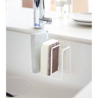 Keep your sponge within reach and your sink area clutter-free with this sleek metal sponge holder. Designed with durability in mind, it is rust resistant and easy to clean. The minimalist design adds a modern touch to your kitchen. Yamazaki Home 3 Sponge Holder, Steel Rack Organizer For Kitchen Sink, Steel, Water Resistant in White | Size 3.4" H X 4.9" W X 2.8" D | AllModern