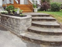 Renovated house entrance way - new retaining wall, walkway, and paver steps in the Rochester - Rochester Hills MI area