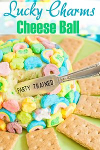 Bring out your inner kid with this no bake Lucky Charms Cheesecake Cheese Ball. Perfect dessert for a kid's party or kid friendly St. Patrick's day treat. Fun, no bake dessert treat. Serve with graham crackers or cookies. #stpattysday #stpatricksday #dips #desserts #luckycharms #sweets #snacks #cereal