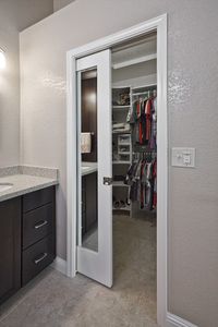 Mirrored pocket door - between bathroom & closet. Would love to do this with my space... and perhaps the door frame between the bathroom and bedroom.