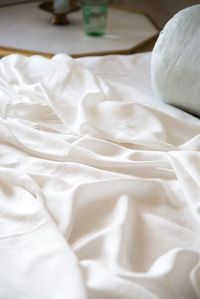 Madera Luxe Sheets in Winter White, Paloma Bolster in Sterling