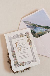 Our pink and colorful invitation suite is perfect for couples looking for unique wedding invitation ideas that combine vintage and modern elements. With handmade paper, an oil painting envelope liner, calligraphy, and vintage stamps, this suite is both personal and unforgettable. Keywords: unique wedding invitations, vintage wedding invitations, handmade wedding invitations, modern wedding invitations, wedding invitation ideas