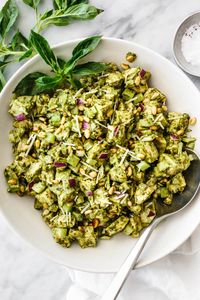 This pesto chicken salad recipe is a fresh basil pesto spin on a classic that will undoubtedly be the summer salad of the season!