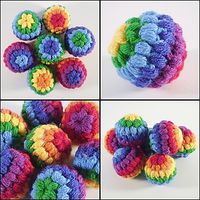 These crochet balls are quick to make and fun to play with. They could also be used as Christmas baubles. Worked in DK weight yarn, they are about 5 cm in diameter and are made almost entirely with puff stitch. The balls are made in two halves and then sewn together.