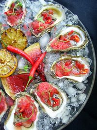 Oysters with grilled watermelon and red pepper.. I want this color palette for my home.. dark color of pan for the walls with white trim with subtle pops of these accent colors!!