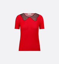 Part of the Dioramour capsule, the sweater is defined by its modern elegance. Delicately crafted in a red cotton-blend knit, it is enhanced by a black lace trompe l'oeil spread collar. The short-sleeved sweater can be styled with other pieces from the Dioramour capsule.. 38