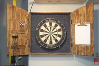 Handmade barn style dartboard cabinet with darts holders, without dartboard. The perfect addition to your man cave. You can choose from Green, Blue, black, red or Grey background. There are many other options, with or without dartboard and several colors, just visit: https://www.etsy.com/shop/MiguelsWoodworks I can make to order Dartboard cabinets, Ice coolers, wine racks, wine and glass holders or any project in rustic look that you might want, just send me a picture of what you want and I will