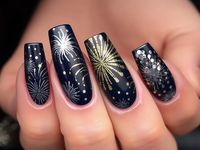 Light up your nails with these bold firework designs! Perfect for a festive and glamorous New Year’s Eve look."