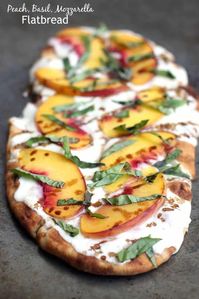 This Peach, Basil, Mozzarella Flatbread is made with fresh ingredients, drizzled with a honey balsamic reduction, and baked in the oven.