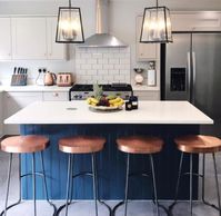 Instead of your typical neutral tones, take your space up a notch by adding colorful bar stools. These bars and kitchens will inspire you to bring a pop of color to your home!