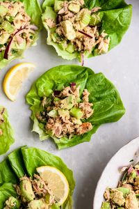 This Easy Avocado Tuna Salad is a delicious, heart-healthy twist on the traditional tuna salad recipe. No mayo necessary thanks to the creamy, rich avocado. It's super flavorful, easy to make and the perfect 5-minute no cook lunch or dinner that’s packed with protein and nutrition. Pile it on bread for a delicious sandwich, stuff it in a tortilla wrap or scoop it in lettuce cups. Great for Whole30, Paleo, Keto and low-carb diets. #lunch #keto #lowcarb #tunasalad #paleo #whole30