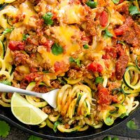 One Pot Taco Zucchini Noodles | ground turkey • garlic • brown onion • diced tomatoes • cheddar • cilantro • lime