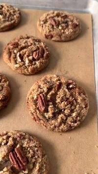 These soft and chewy maple pecan crumble cookies are made with a gooey maple cookies swirled with ribbons of cinnamon sugar and topped with a salty-sweet maple pecan streusel. 1/4 cup light brown sugar, packed 2 teaspoons ground cinnamon For The Maple Cookies 1/2 cup unsalted butter, at room temperature 3/4 cup light brown sugar 2 tablespoons pure maple syrup 1 egg, room temperature 2 teaspoons vanilla extract 1 teaspoon maple extract 1 3/4 cups all-purpose flour 1/2 teaspoon salt 1/2 teaspoon baking powder 1/4 teaspoon baking soda For The Maple Pecan Crumble Topping 1/4 cup unsalted butter, at room temperature 3 tablespoons light brown sugar, packed 1 teaspoon pure maple syrup 1/3 cup all-purpose flour 3 tablespoons chopped pecans pinch of salt