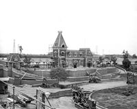 A very rare photo of the construction of the Main Street Station, the popular starting point of your “grand circle tour” aboard the vintage trains of the Disneyland Railroad.