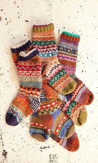 You can't beat hand knitted socks - they make a great christmas present and the perfect thing to keep cosy in around the fire. House - Plümo Ltd