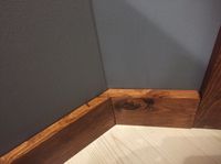 Rustic Bathroom Baseboard Update