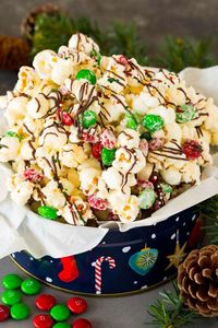 This Christmas popcorn is a sweet and savory blend of popcorn, white chocolate, dark chocolate, M&M’s and holiday sprinkles.