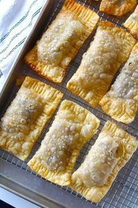 This Brazilian Pastel recipe with savory ground beef (or chicken) filling is so easy to make at home for a fun snack, appetizer, or even main dish! Feed a few or a crowd!     Okay friends, get ready for the most delicious, flaky, crispy, savory, fried pastry! This is the traditional Brazilian Pastel Recipe! Pasteis (the plural of pastel in Portuguese) are light, thinly rolled pastry dough pockets filled with a variety of ingredients, but most notably with cheese (queijo) and/or beef. Thi…