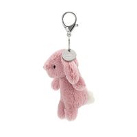 Clip on the Bashful Bunny Tulip Bag Charm and give your satchel some blush-berry sweetness. This supersoft bunny has long, lovely ears, so when you jog along, it looks like they're flying! May our little pink pal bring you warrens of luck. Sponge clean only; do not tumble dry, dry clean or iron. Not recommended to clean in a washing machine. Check all labels upon arrival of purchase.