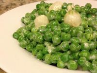 This is a wonderful recipe that calls for fresh or frozen peas and fresh pearl onions. It's quick and tasty.