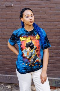 Add some super saiyan style to your everyday look with this officially licensed Dragon Ball Z Super Vegeta T Shirt. This t shirt features the almighty Prince of the Saiyans Vegeta on the front and will make a stellar addition to your t shirt collection. Any anime fans will love rocking this tee at their next anime convention.