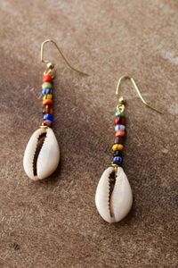 Multicolored cowrie shell drop earrings made using colorful African glass beads and wiring. These earrings measure about 2" (inches) in length and are very lightweight!