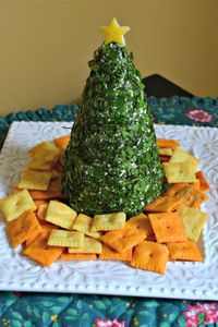 Cream Cheese, Havarti, and Parmesan Herbed Christmas Tree | "This delicious cream cheese-based appetizer is a great addition to any holiday party and is always a hit with guests due to its festive look!" #allrecipes #christmas #christmasrecipes #christmasmeal #holidays #holidayrecipes