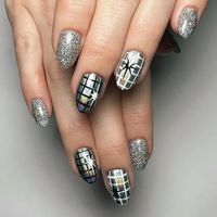 Time to find your New Years Eve nail inspo! Sneak a peek at our fave New Years nail art ideas—like these shimmery silver disco ball New Years nails—to find the shimmery manicure everyone at that NYE party will LOVE.