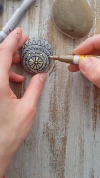 Shiny rock painting tutorial with painted on stones. Hand-painted stones created with Artistro permanent paint pens.Artistro’s permanent paint markers flow smoothly without flooding, jamming, or dying at the fine tip. Colored stones will be nice decoration in your home.