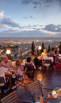 Enjoy a sunset view of the Alhambra on Day 8 of the Rick Steves Best of Spain Tour.