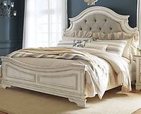 Realyn Queen Upholstered Panel Bed | Ashley