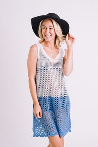 This gorgeous beach dress is crocheted in three colors — cornflower blue, sky blue and white — to represent the ocean, sky and clouds. Each block of color features a different stitch design, making this piece as fun to crochet as it is to wear. Combined with a flattering v-neck and a delicate scalloped edge, you’ll find yourself coming back to this piece every summer.