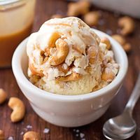 Ultra creamy homemade ice cream studded with roasted cashews and swirled with salted caramel. It's rich, decadent and absolutely delicious!