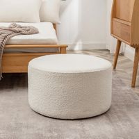 Wade Logan® Brichelle 24'' Wide Modern Round Boucle Upholstered Ottoman & Reviews | Wayfair