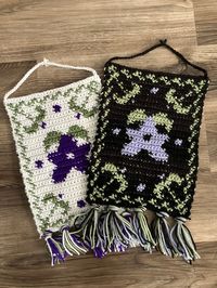 Handmade crochet wall hanging of a Stardrop from the video game Stardew Valley. Colors may vary slightly from different yarns. 13 inches long without tassels, around 16 inches with. 9.5 inches wide. both versions are made from acrylic yarn.