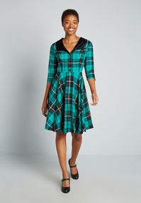 So superbly 50’s-inspired, this gorgeous green and black tartan print swing dress is coming to you from Hell Bunny London!