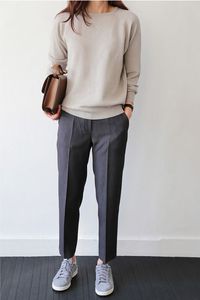 Trousers, simple sneakers, plain sweater, clean bag/clutch