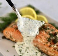 Creamy Dill Sauce This tried and true Creamy Dill Sauce is simply amazing over seafood. The fresh lemony dill flavor adds the most perfect finishing touch! #creamydillsauce #ketosauces #homemadedillsauce