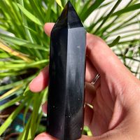 You will receive ONE intuitively chosen black onyx tower Black onyx is a protective and grounding stone Keep this tower in your living area or room to absorb negative energies that may be lingering in your home All stones are natural and have natural markings