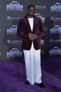 #DanielKaluuya wears a #Burberry velvet tailored jacket styled with a traditional kanzu to the premiere of #BlackPanther in Los Angeles